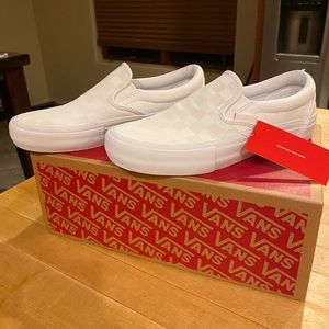 White reflective slip on vans